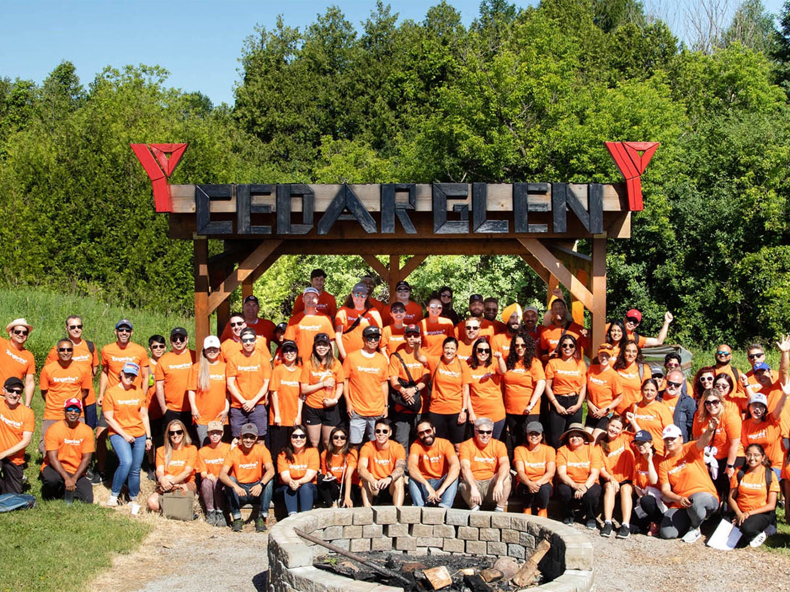A large group of Tangerine employees at the YMCA Cedar Glen Outdoor Centre. 